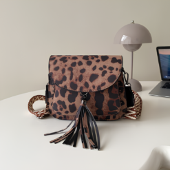 Cross Body Bag Saddle Style With All Over print And Tassel Stud Detail Leopard Print, Includes Wide Strap